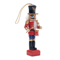 Klein houten hangornament in notenkrakervorm, rood