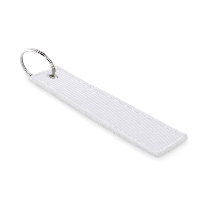 Langwerpige sleutelhanger in vliegtuigstijl, wit